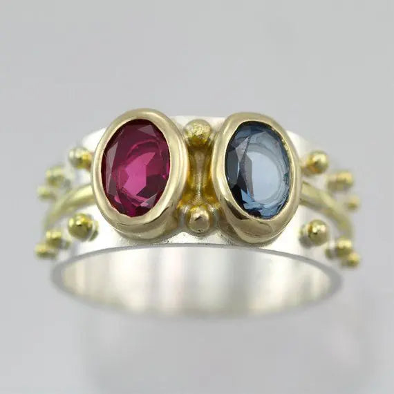 Vintage ring with blue and red crystal
