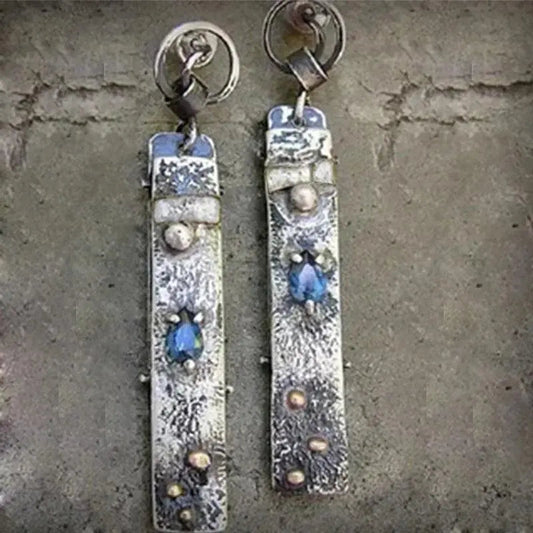 Handmade earrings made of blue stone
