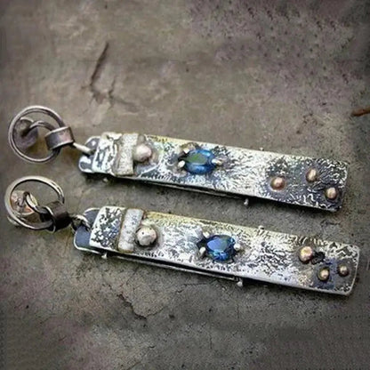 Handmade earrings made of blue stone