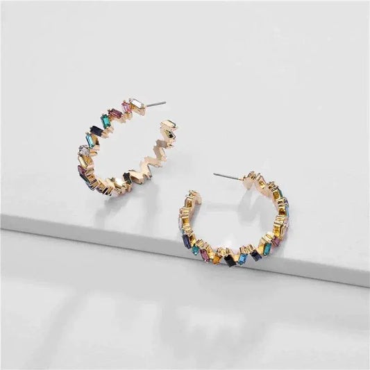 Gold earrings with colored stones