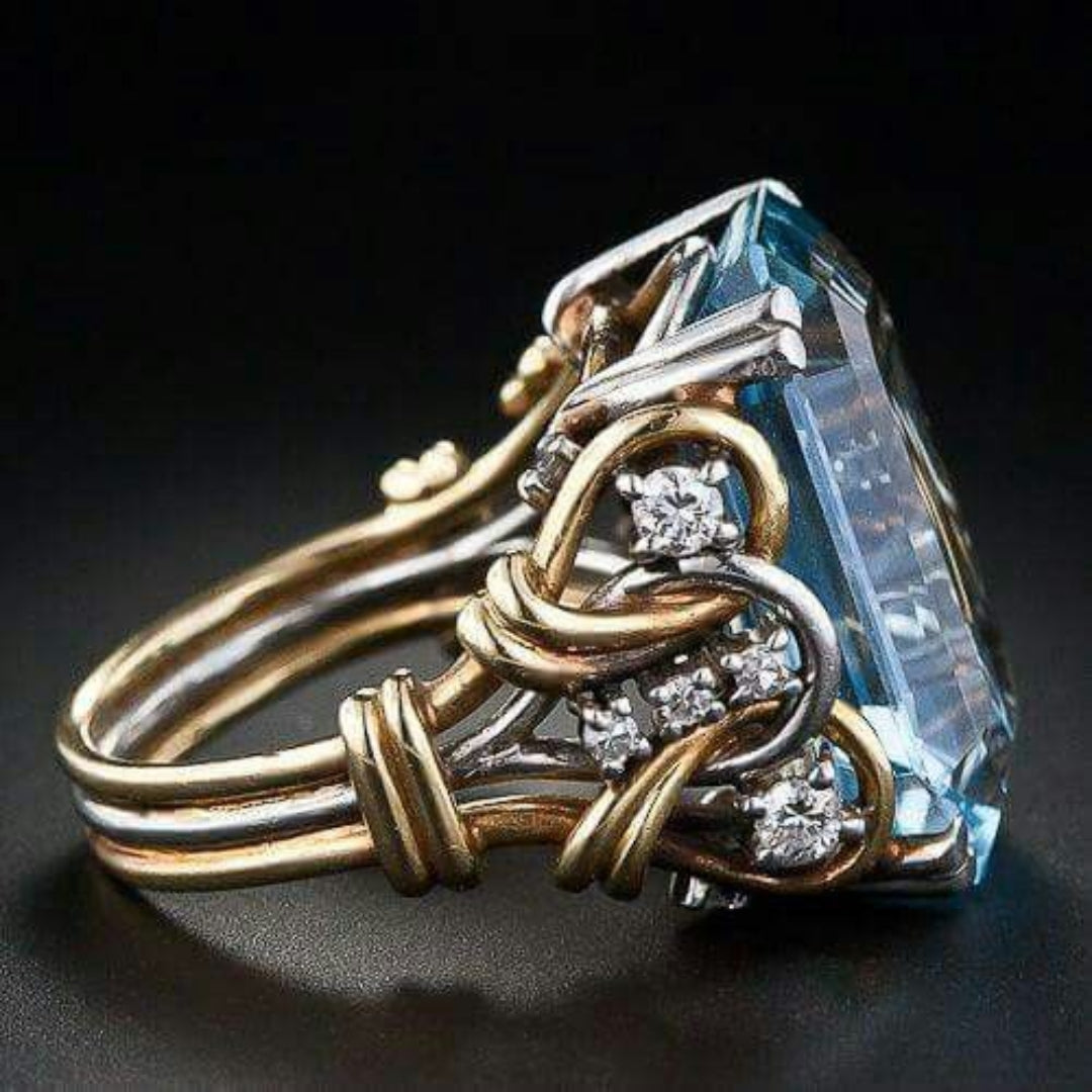 Layered gold ring with blue zirconia