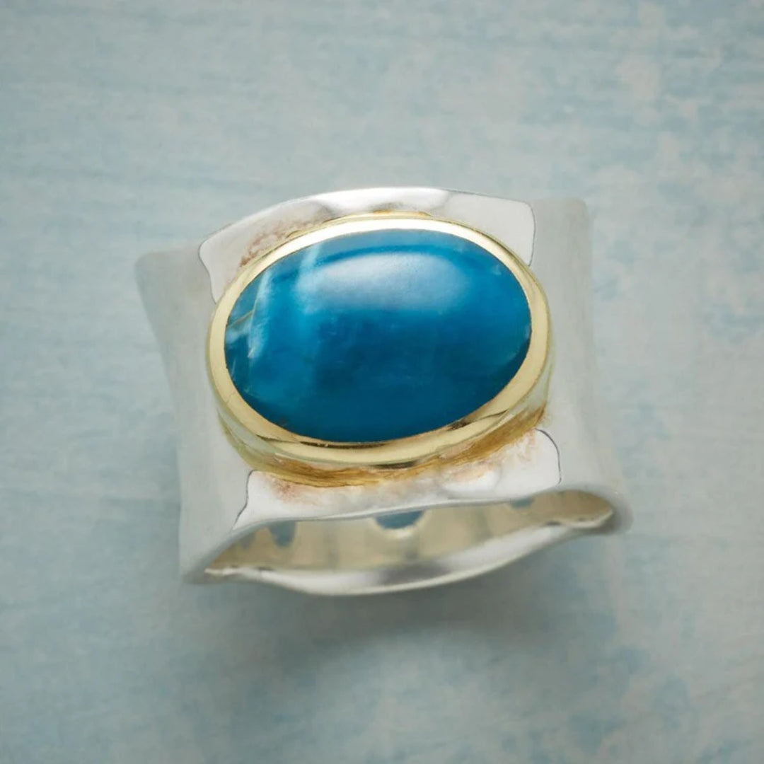 Vintage silver ring with oval blue stone