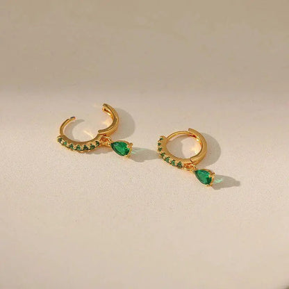 Zirconia earrings with emerald in gold