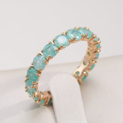 Luxurious gold ring with colored zirconia stones