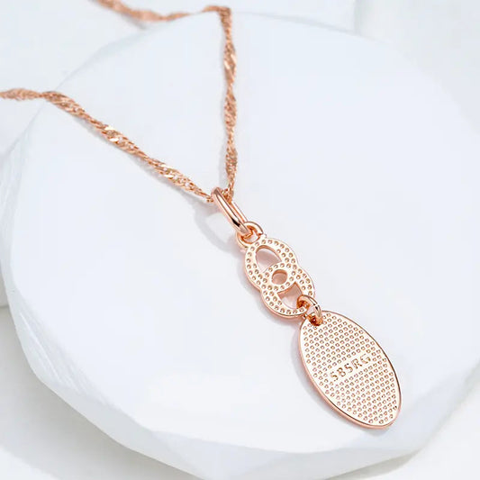 Gold-plated necklace with a shiny tip