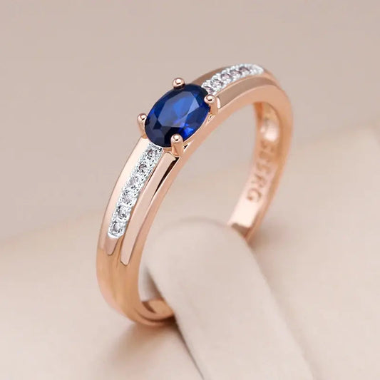 Ring with blue crystal in gold