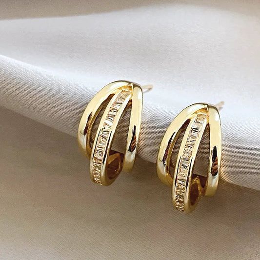 Triple Tire Earrings in Gold