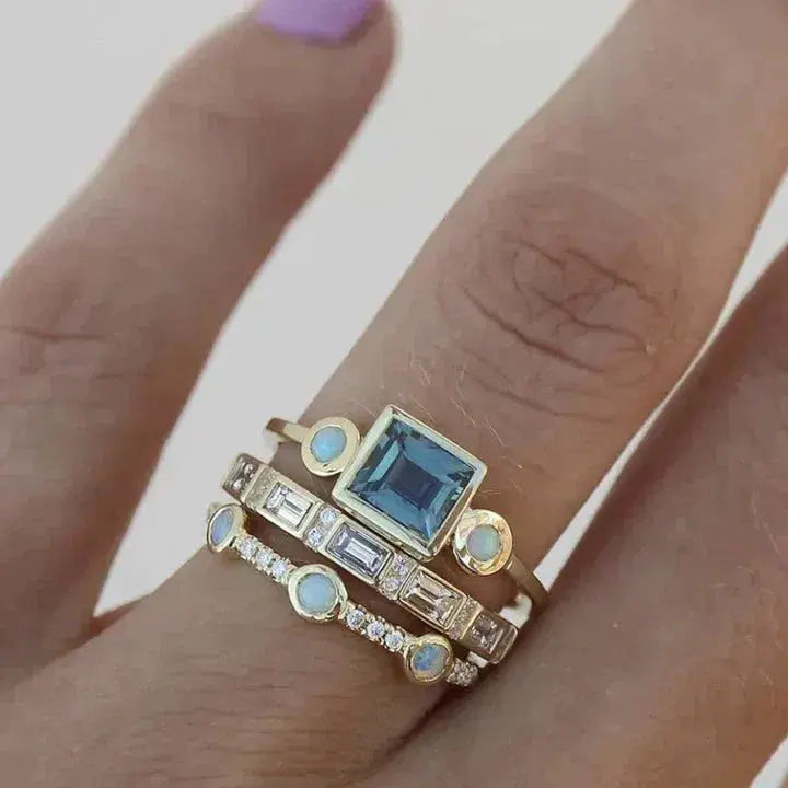 Vintage-style ring with blue crystal