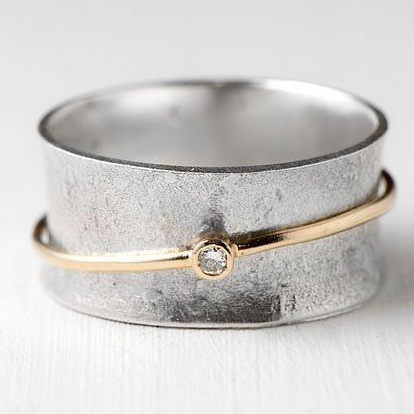 Vintage silver ring with golden line and zirconia