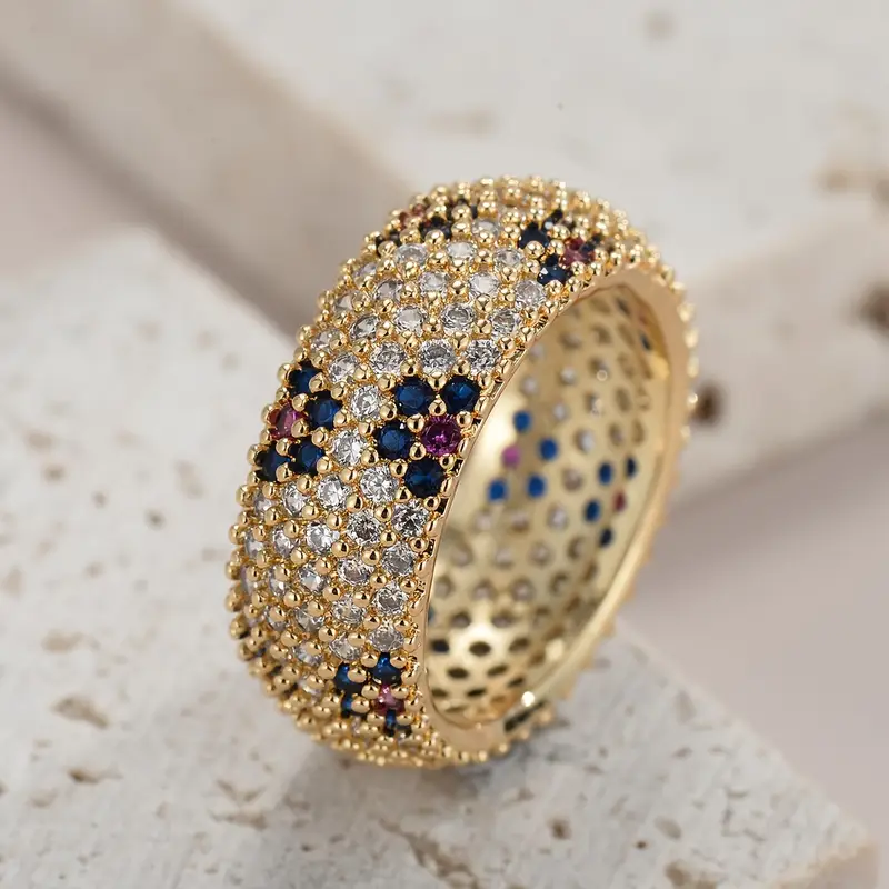 Gold ring set with blue and purple zirconia