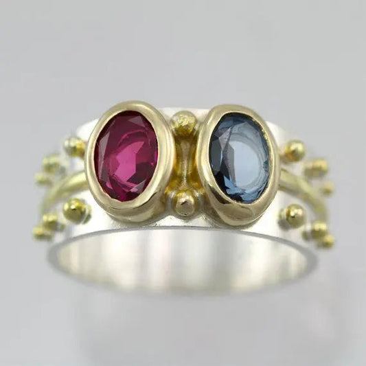 Vintage ring with blue and red crystal