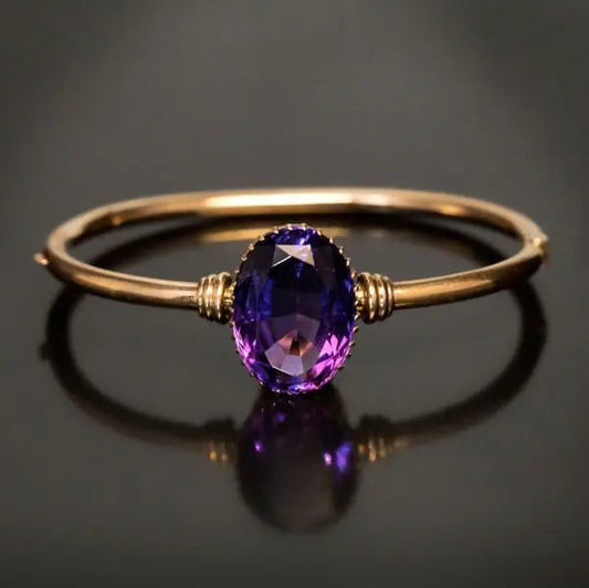 Ring with purple crystal in vintage gold